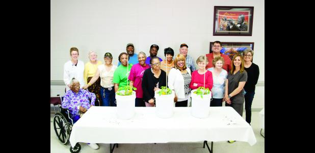 Diabetes Self-Management Education Support Group members learning about bucket gardening for spring are, front row, from left, Hattie Jones, Jewel Bohanon, Wornester May, Dorothy Standfield, Elizabeth Grady, Betty Turner, Joy Peterson, Emily Ann Brown, Charlotte Poland, RN, CDE; second row, Tammy Johnston, RN, CDE, Jessie Klett, Oscar Hopkins, Eric Cleveland, Carolyn Harrison, James Peterson, Brendan Brown and Cynthia Warner, Master Gardner.
