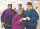 The Pilot Club of Richland supports programs at RARC’s The Manger in Delhi with an annual contribution and with an annual  Halloween party for clients. Shown accepting this year’s funds from Pilot Club Treasurer Danna Gillett are Shalane, Phillip and Joyce of The Manger.